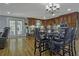 Modern kitchen with ample cabinetry, breakfast bar and hardwood floors at 4320 Chapel Hill Farms Dr, Douglasville, GA 30135