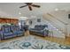 Bright living room with hardwood floors, fireplace and comfortable seating at 4320 Chapel Hill Farms Dr, Douglasville, GA 30135