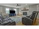 Relaxing living room with hardwood floors, fireplace and comfortable seating at 4320 Chapel Hill Farms Dr, Douglasville, GA 30135