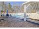Flagstone patio, pool, and pergola create an outdoor oasis at 4320 Chapel Hill Farms Dr, Douglasville, GA 30135