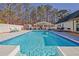Refreshing blue swimming pool and spacious backyard at 4320 Chapel Hill Farms Dr, Douglasville, GA 30135