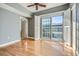 Bright bedroom with hardwood floors and access to a private balcony at 195 14Th Ne St # 2907, Atlanta, GA 30309