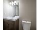 Updated bathroom featuring a vanity and toilet at 2947 Pebblebrook Dr, Buford, GA 30518