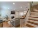 Living area with hardwood floors, fireplace, and staircase at 35 Mount Vernon Cir, Atlanta, GA 30338