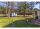 Large backyard with shed and patio at 553 Wellington Way, Jonesboro, GA 30238