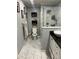 Bathroom with marble shower and vanity at 553 Wellington Way, Jonesboro, GA 30238