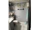 Updated bathroom with marble floors and vanity at 553 Wellington Way, Jonesboro, GA 30238