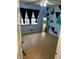 Bright bedroom with light blue walls, geometric accent wall, and wood flooring at 553 Wellington Way, Jonesboro, GA 30238