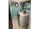 Bright laundry room with washer, dryer, and shelving at 553 Wellington Way, Jonesboro, GA 30238