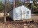 Detached storage shed in backyard at 553 Wellington Way, Jonesboro, GA 30238