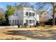 Modern white two-story home with a flat roof and large windows at 860 Cardova Ne Dr, Atlanta, GA 30324