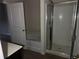 Bathroom features a shower and tub combination with a vanity at 132 Oliver Dr, Locust Grove, GA 30248