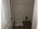 Laundry room with connections and dirty tray on the floor at 132 Oliver Dr, Locust Grove, GA 30248