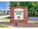 Hunter Park brick sign in Douglasville, GA with green trees at 2812 Lillian Ln, Douglasville, GA 30135