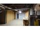 Unfinished basement with workbench and water heater at 4153 Wellington Hills Dr, Snellville, GA 30039