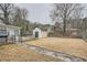 Spacious backyard with shed and walkway at 6685 Smoke Ridge Dr, Atlanta, GA 30349