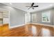 Bedroom with hardwood floors, ceiling fan, and closet at 396 15Th Street Nw # 95, Atlanta, GA 30318