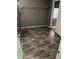 This empty closet features gray walls, wood-look floors and metal shelving at 4402 Highland Rd, Decatur, GA 30035