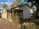 Tan vinyl-sided house with a covered porch at 4402 Highland Rd, Decatur, GA 30035
