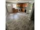 Bright kitchen with modern appliances, wood cabinets, and a window providing natural light at 4402 Highland Rd, Decatur, GA 30035