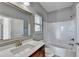 Bathroom features a shower/tub combo and vanity at 490 La Perla Dr, Sugar Hill, GA 30518