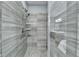 Walk-in shower with glass enclosure and modern fixtures at 490 La Perla Dr, Sugar Hill, GA 30518