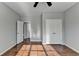 Bright bedroom with hardwood floors and double closets at 490 La Perla Dr, Sugar Hill, GA 30518
