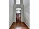 Bright entryway with hardwood floors and two-story high ceilings at 490 La Perla Dr, Sugar Hill, GA 30518