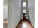 Bright entryway with hardwood floors and two-story high ceilings at 490 La Perla Dr, Sugar Hill, GA 30518