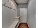 Convenient laundry room with built-in bench and storage at 490 La Perla Dr, Sugar Hill, GA 30518