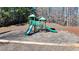 playground with slides and climbing structures at 490 La Perla Dr, Sugar Hill, GA 30518
