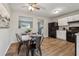 Modern kitchen with black appliances and granite countertops at 1259 Mill Lake Cir, Stone Mountain, GA 30088