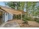 Wooden pergola covers this back patio at 1259 Mill Lake Cir, Stone Mountain, GA 30088