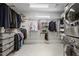 Laundry room with built-in shelving and washer/dryer at 6736 Cadence Blvd, Sandy Springs, GA 30328