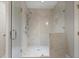 Large walk-in shower with marble tile and glass enclosure at 6736 Cadence Blvd, Sandy Springs, GA 30328