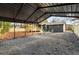 Gravel carport with storage shed and backyard view at 1377 Dorothy Dr, Decatur, GA 30030