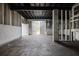 Unfinished basement with concrete floors and walls, ready for customization and new flooring at 366 Greycoat Sw Blf, Marietta, GA 30064