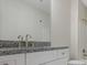 Bathroom featuring a granite countertop, toilet, and tiled shower and tub at 366 Greycoat Sw Blf, Marietta, GA 30064