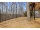 Wooden deck featuring a metal fence, staircase, and mature trees growing up through the deck at 366 Greycoat Sw Blf, Marietta, GA 30064