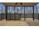 This wooden deck offers a beautiful space with black metal railings and a view of the trees at 366 Greycoat Sw Blf, Marietta, GA 30064