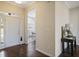 Inviting foyer with hardwood floors, a front door with sidelights, and a view into the dining room at 366 Greycoat Sw Blf, Marietta, GA 30064