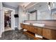 Modern bathroom with double vanity and city views at 1065 Peachtree Ne St # 3102, Atlanta, GA 30309