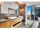 Modern bathroom with double vanity and city views at 1065 Peachtree Ne St # 3102, Atlanta, GA 30309
