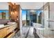 Modern bathroom with double vanity and city views at 1065 Peachtree Ne St # 3102, Atlanta, GA 30309