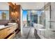 Modern bathroom with marble floors and city views at 1065 Peachtree Ne St # 3102, Atlanta, GA 30309
