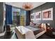 Spacious bedroom with city view and large windows at 1065 Peachtree Ne St # 3102, Atlanta, GA 30309