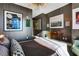 Bright bedroom with large artwork and city view at 1065 Peachtree Ne St # 3102, Atlanta, GA 30309