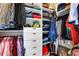 Large walk-in closet with ample shelving and drawers at 1065 Peachtree Ne St # 3102, Atlanta, GA 30309