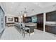 Community lounge with granite bar, seating, and modern appliances at 1065 Peachtree Ne St # 3102, Atlanta, GA 30309