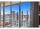 Modern light fixtures over a city view at 1065 Peachtree Ne St # 3102, Atlanta, GA 30309